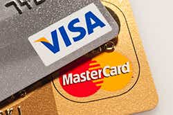 How are Visa and MasterCard travel cards different