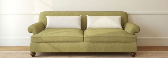 Empty couch in a room | Canstar