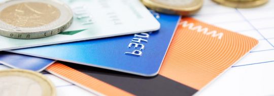 Coins on cards | Canstar