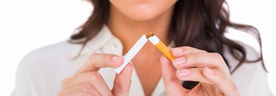 Woman with a broken cigarette