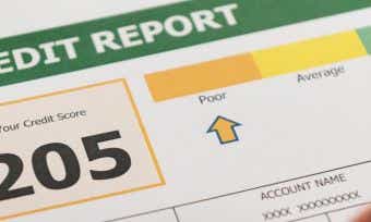 What is a credit report and what does it include?