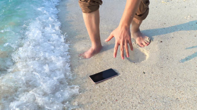 phone beach water