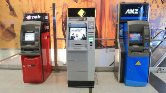 A row of ATMs, from NAB, CommBank and ANZ