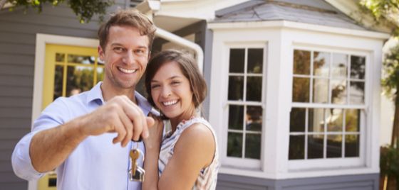 couple after buying their first home