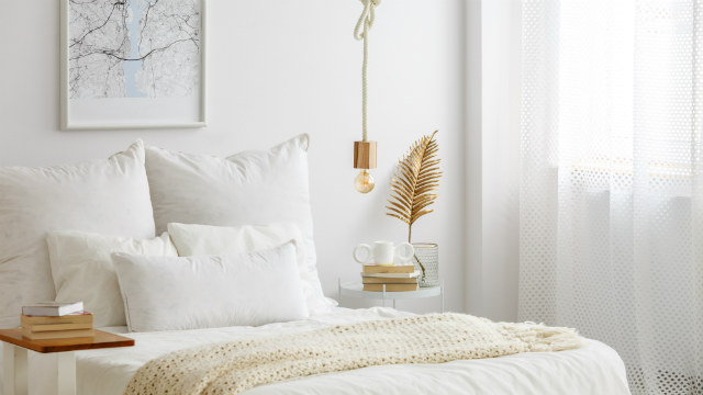 Gold accents lift this bedroom decor.