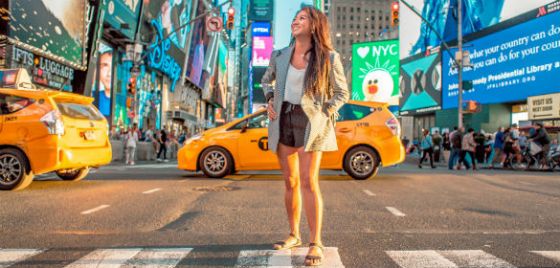 Image of a woman travelling in New York City.