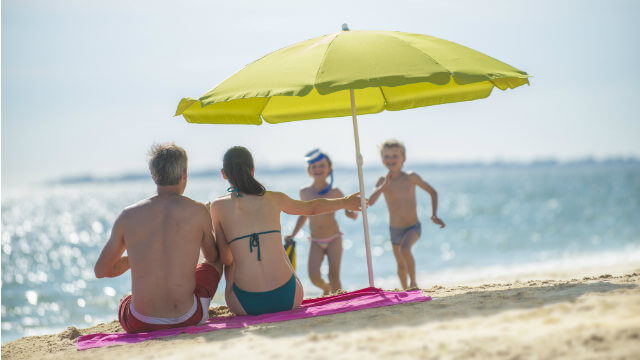 children travel insurance beach umbrella