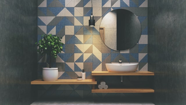 blue geometric feature tiles in bathroom