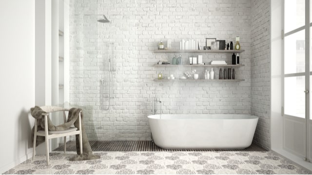 white brick feature wall in bathroom