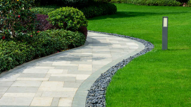 Rocks used as garden edging. Image: Hrui (Shutterstock)