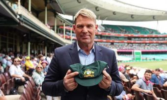 Bushfire relief auctions: Warnie's baggy green sold to CommBank for $1 million