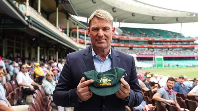 Shane Warne auctions baggy green for bushfires