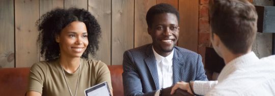 hhappy couple dealing with their bank home loan