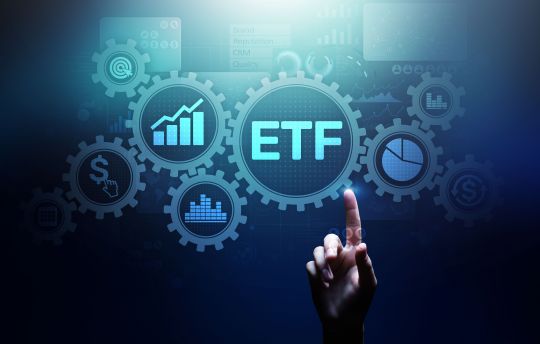 the work ETF in a cog with other investment symbols surrounding