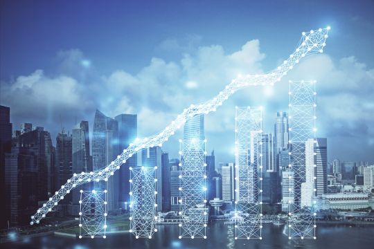 Growth incline graph imposed on skyscrapers