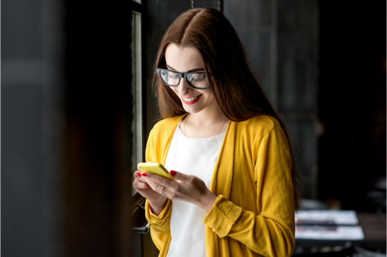 Woman scrolling on smartphone