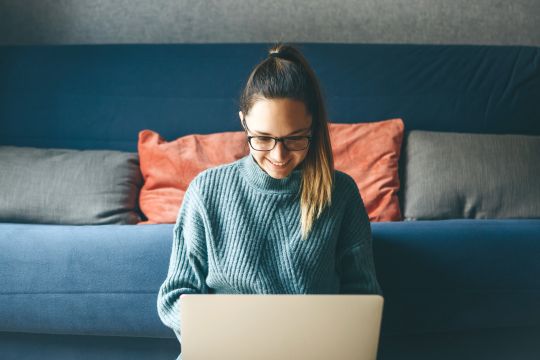 A lady on a laptop working from home