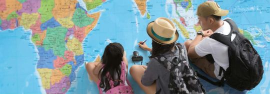 Family looking at map