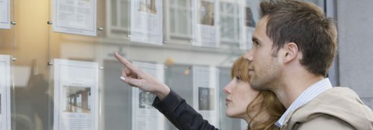 Couple looking at property for sale