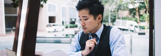 Man looking at paperwork
