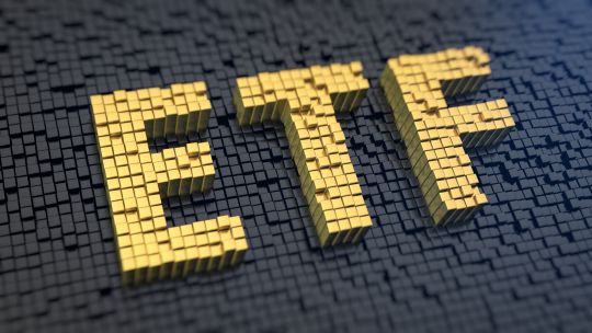ETF in yellow bricks surrounded by black background