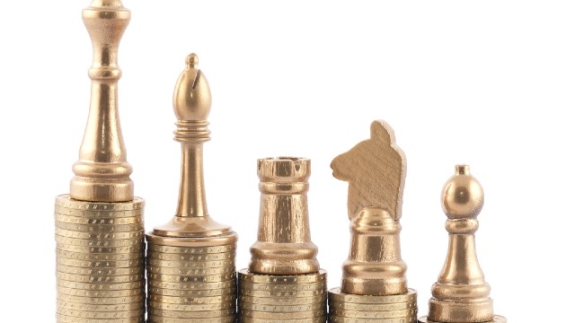 Chess pieces on coins