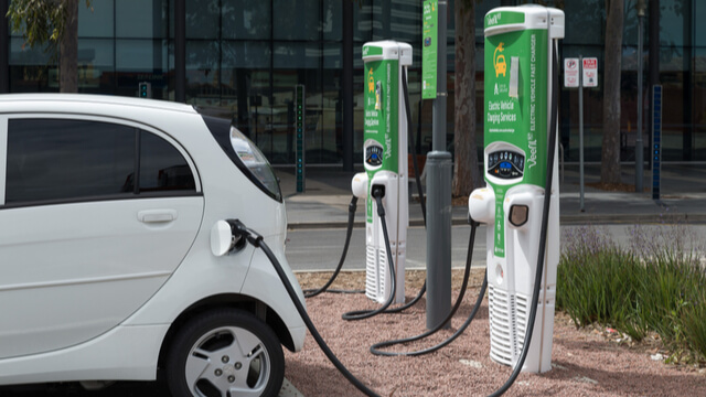 A car at an electric vehicle charging station