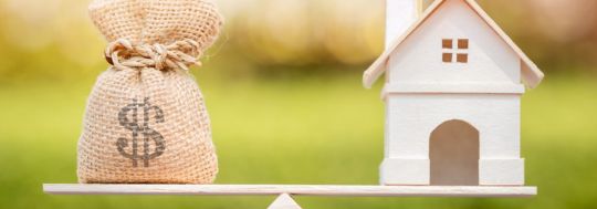 House on scales
