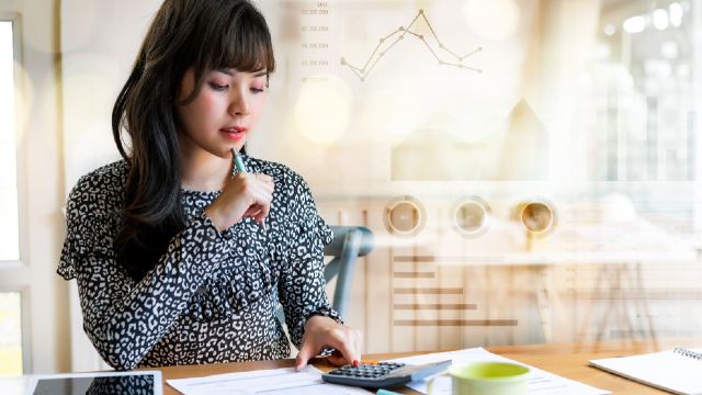 Woman thinking about investing