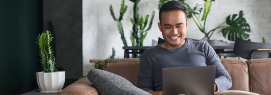 Man working fom couch