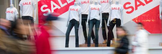 Shop window advertising a sale