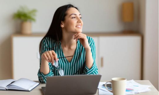 A young women with a laptop computer