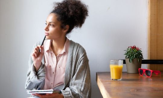 Young woman thinking