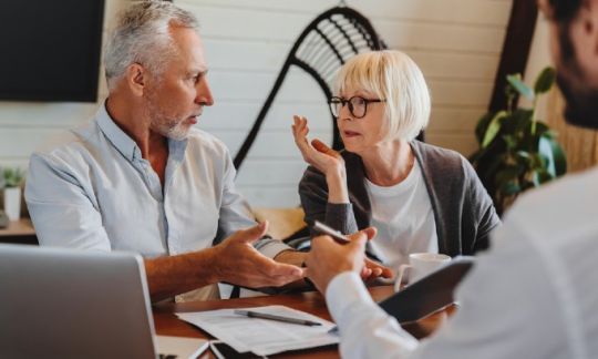 A couple get some independent financial advice on your super