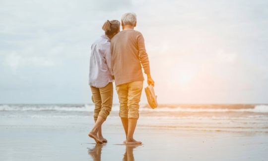 A couple enjoying retirement at the beach