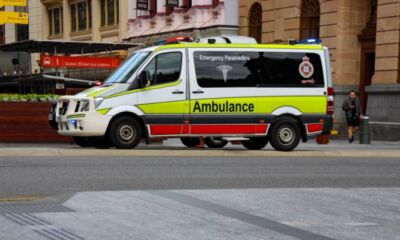 A QAS ambulance on Queen Street Mall in Brisbane representing ambulance cover in Queensland.