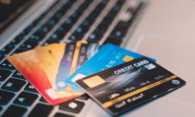 Credit cards on laptop keyboard