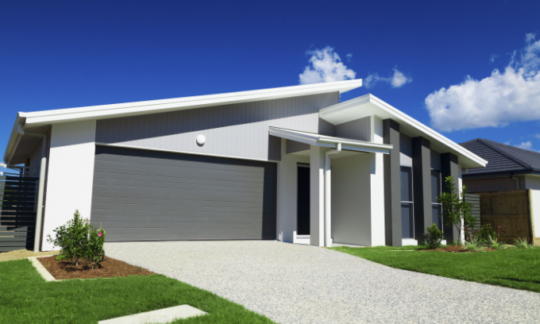 A modern home that represents how much should I insure my house for?
