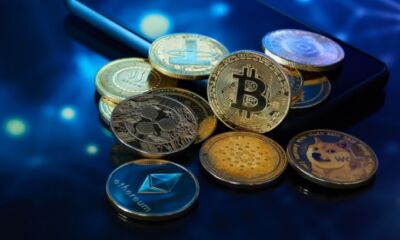 A pile of cryptocurrencies representing how to invest in crypto in australia.