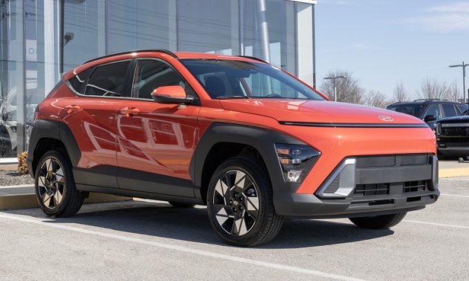An orange 2024 Hyundai Kona.