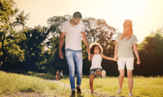 A young family, mum and dad with a young girl.
