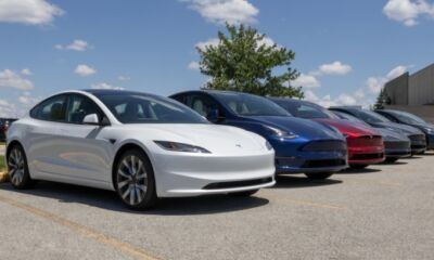 A row of Tesla cars representing the best selling electric car.