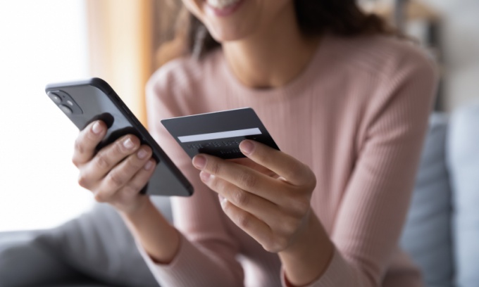 Is it better to use PayPal or a credit card for online purchases?